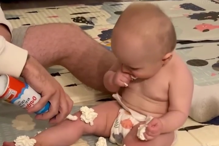 Family Enjoys a Spray Can of Whipped Cream